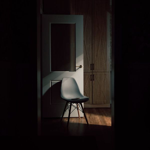 Comfortable chair in a dimly lit modern office space